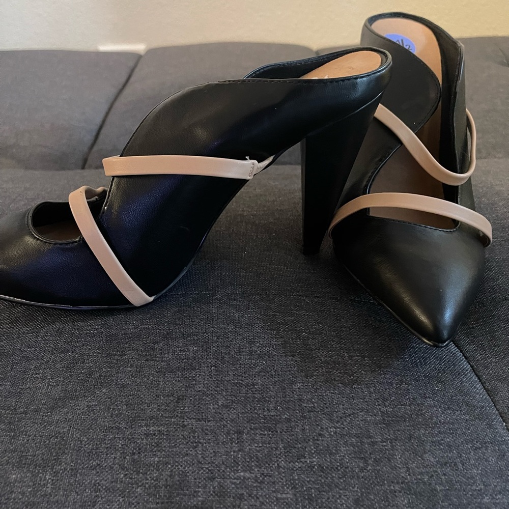 Black and tan low heel shoes